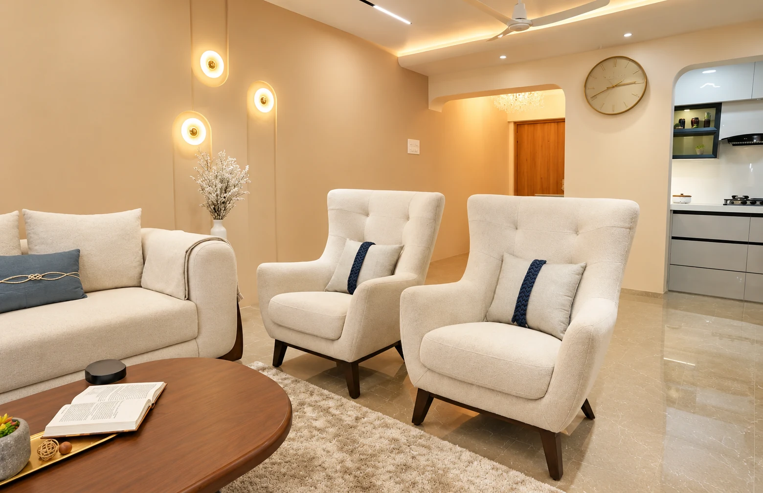 High-backed armchairs and circular wall lights in the living area.